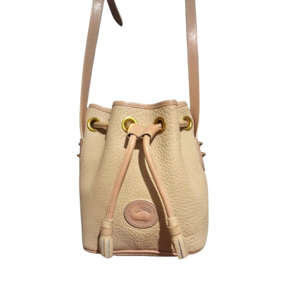 Dooney & Bourke Handbags - Dooney & Bourke Cream Pebbled Leather Bucket Bag